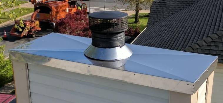 replaced metal chimney cap